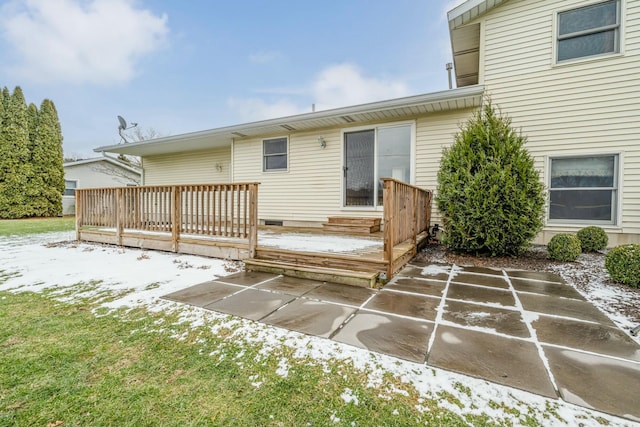 rear view of house with a patio and a deck