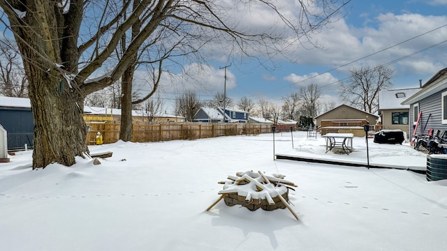 view of yard covered in snow