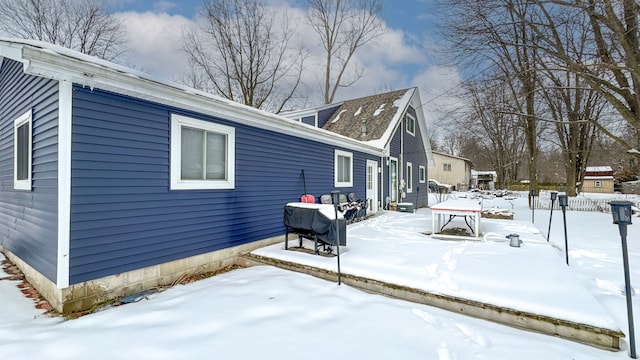 view of snow covered property