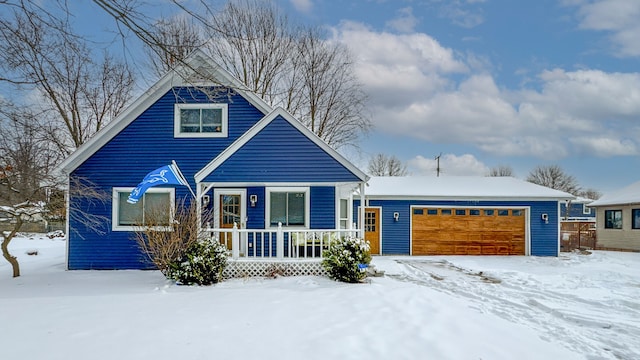 view of front of home with a garage and covered porch