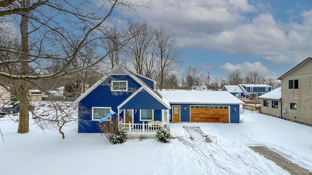 view of front of house featuring a garage and covered porch