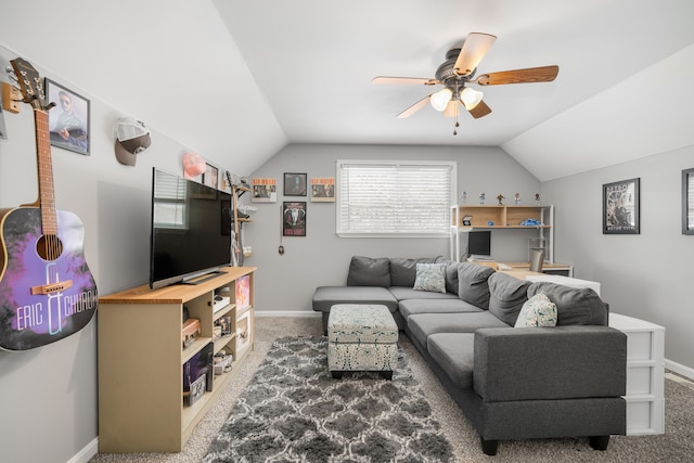 carpeted living room featuring vaulted ceiling and ceiling fan