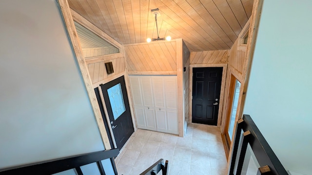 foyer entrance with wooden ceiling