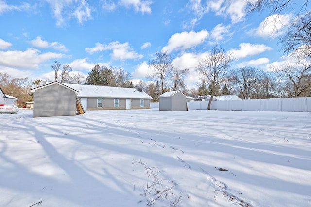 view of yard layered in snow