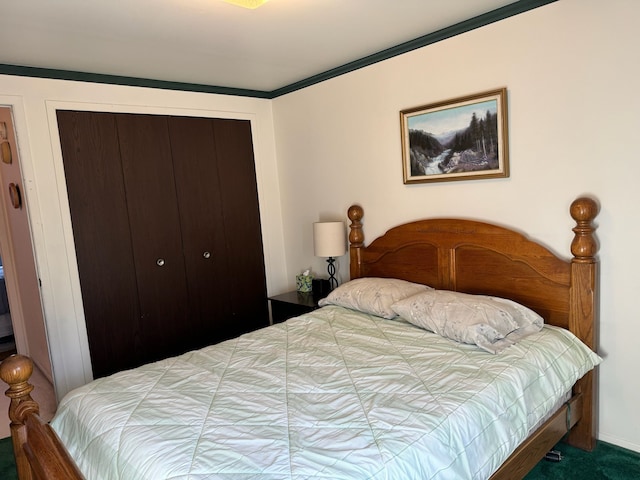 carpeted bedroom featuring a closet