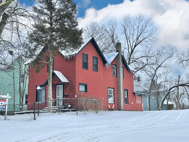 view of snow covered property