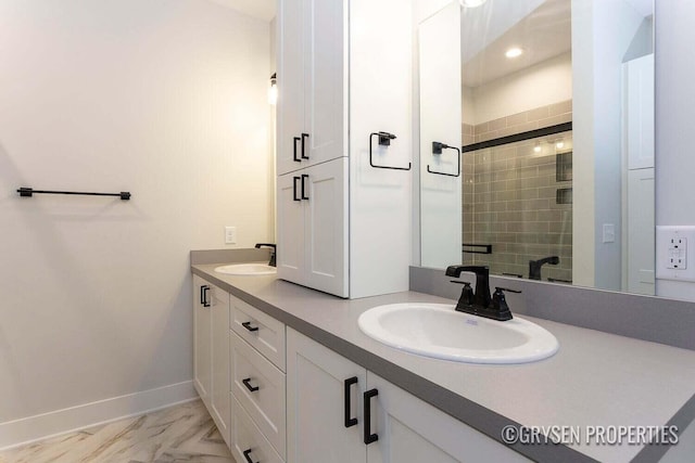 bathroom featuring vanity and walk in shower