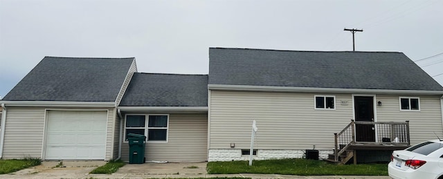 8017 S Saginaw St, New Lothrop, MI 48460 - view of front facade with an attached garage