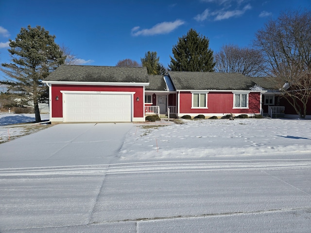 ranch-style house featuring a garage