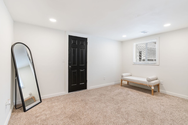 sitting room with light carpet