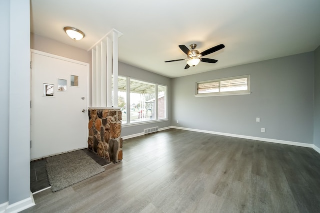 foyer featuring ceiling fan and wood-type flooring