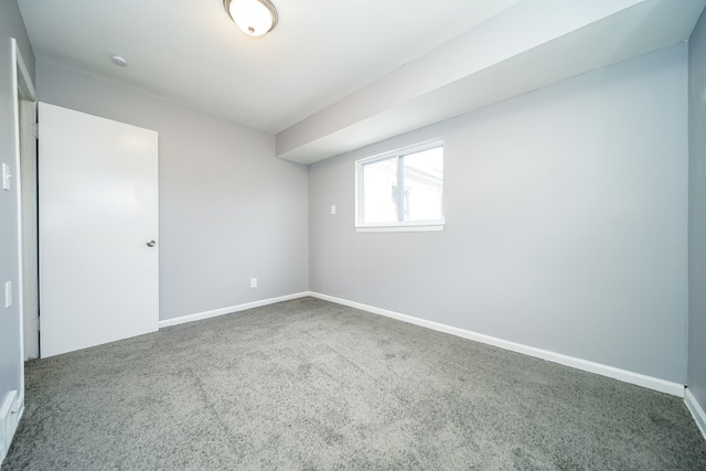 unfurnished room with carpet floors