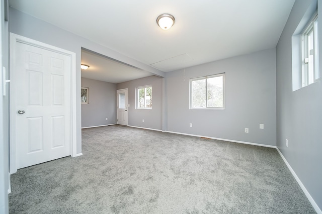 view of carpeted spare room