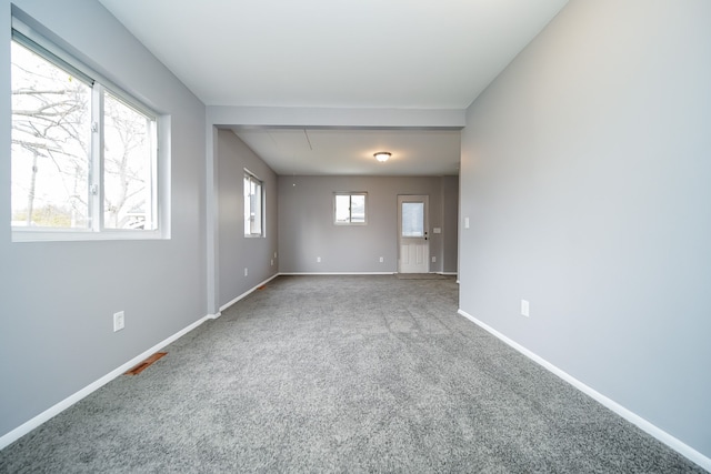 view of carpeted spare room