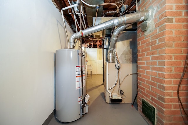 utility room featuring heating unit and gas water heater