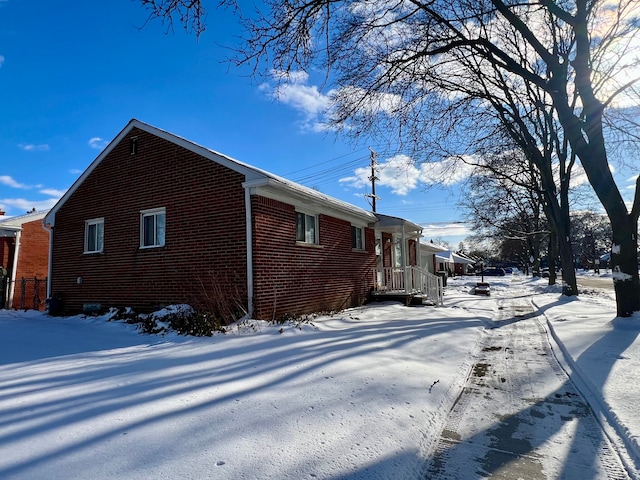 view of snow covered property