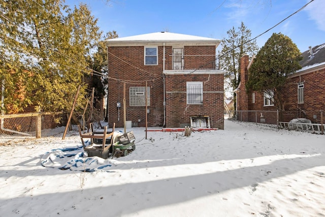 view of snow covered property