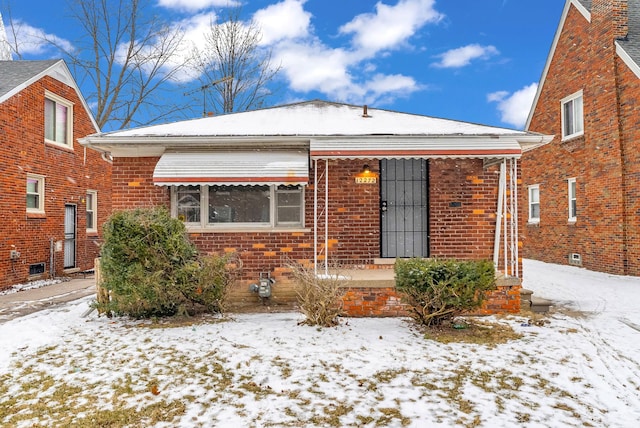 bungalow-style home with covered porch