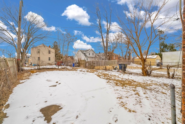 view of yard covered in snow