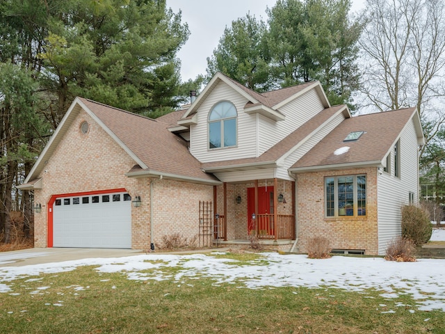 view of front facade with a garage and a front lawn