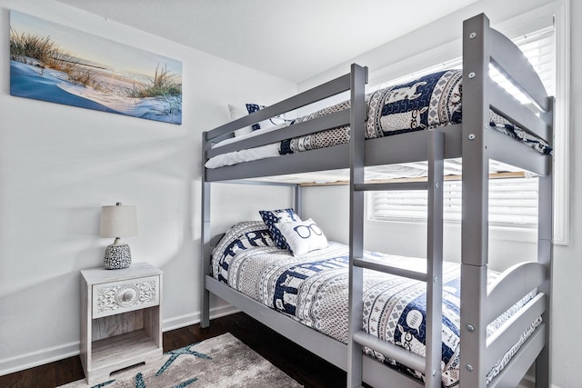 bedroom featuring dark wood-type flooring