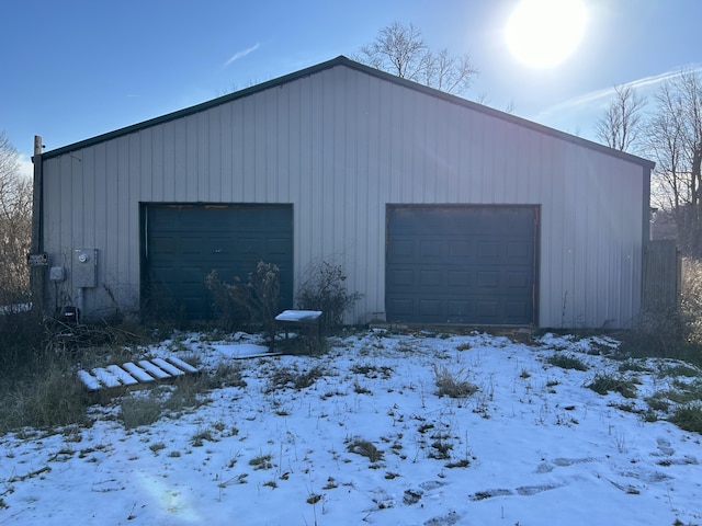 view of snow covered garage