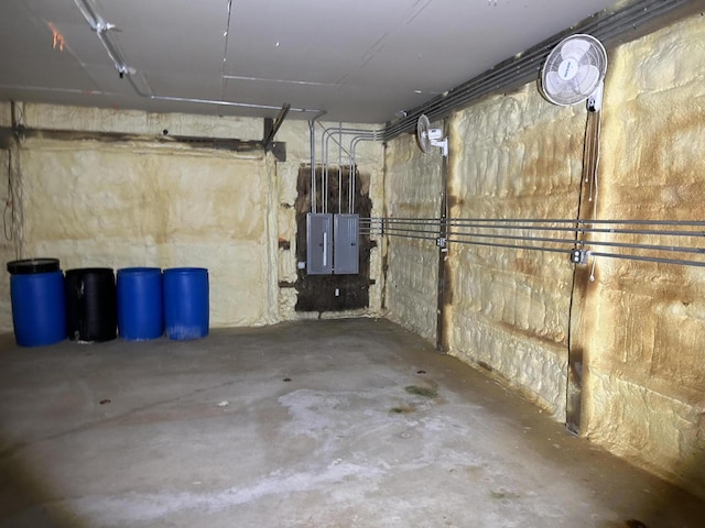 basement featuring electric panel