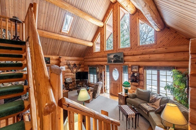 living room with high vaulted ceiling, a skylight, beamed ceiling, log walls, and wood ceiling