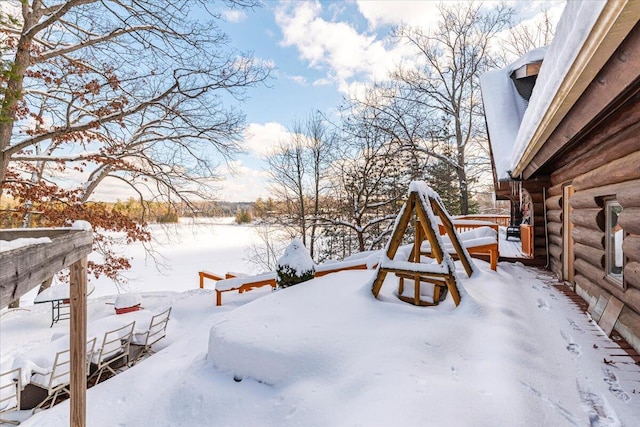 view of yard covered in snow