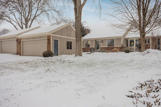 single story home featuring a garage