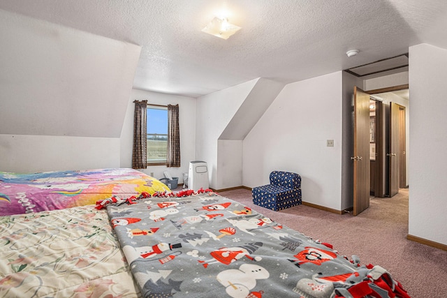 bedroom featuring lofted ceiling, light colored carpet, and a textured ceiling