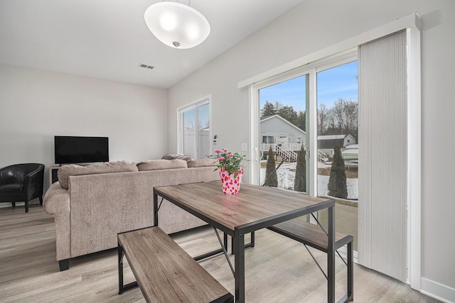 dining room featuring light wood-type flooring