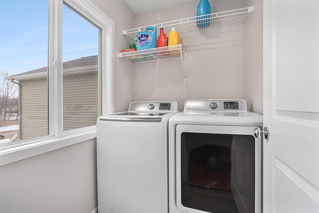 washroom with washer and clothes dryer