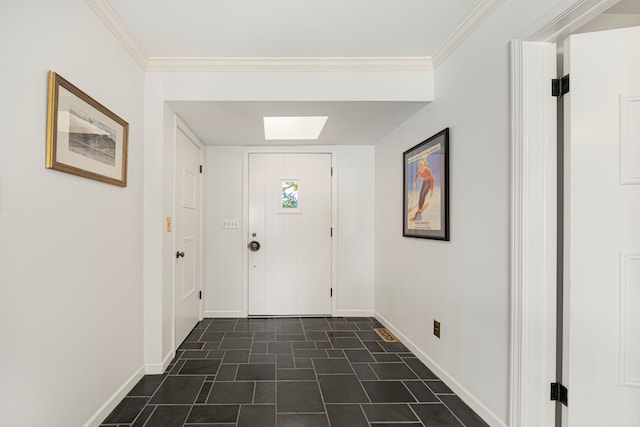 entryway with ornamental molding and a skylight