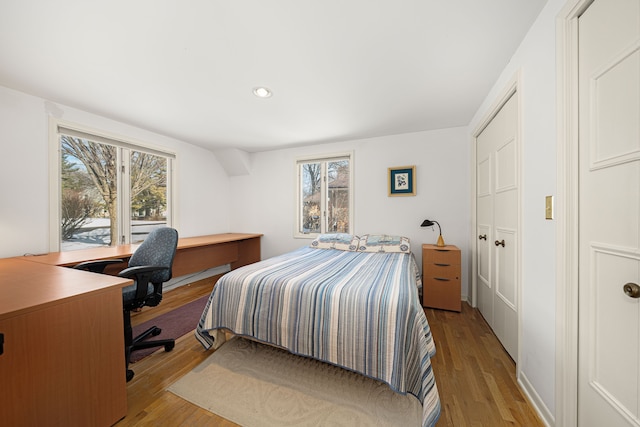 bedroom with light wood-type flooring