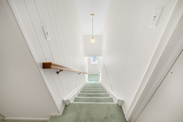 stairway with carpet flooring