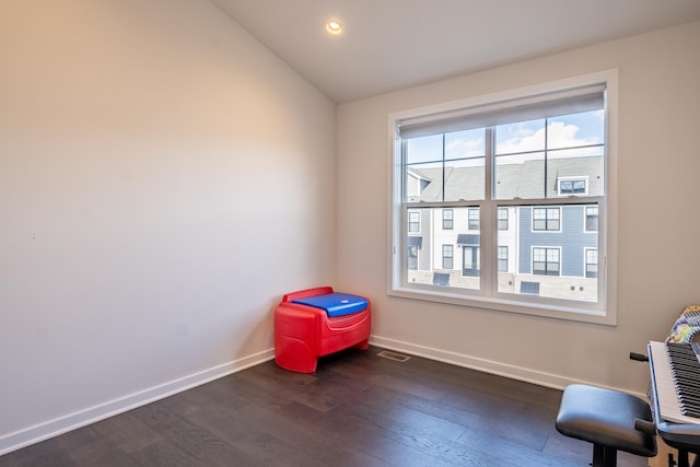 miscellaneous room featuring recessed lighting, visible vents, dark wood finished floors, and baseboards