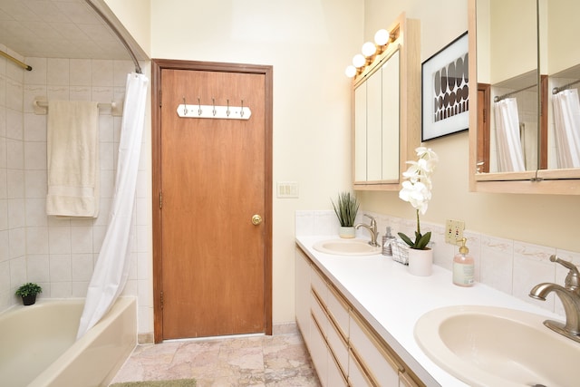 bathroom with vanity and shower / tub combo