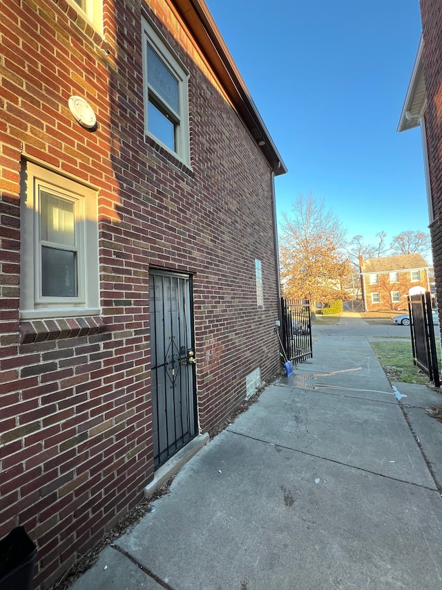 view of side of property with a patio area