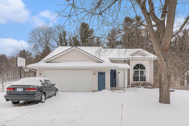 single story home featuring a garage