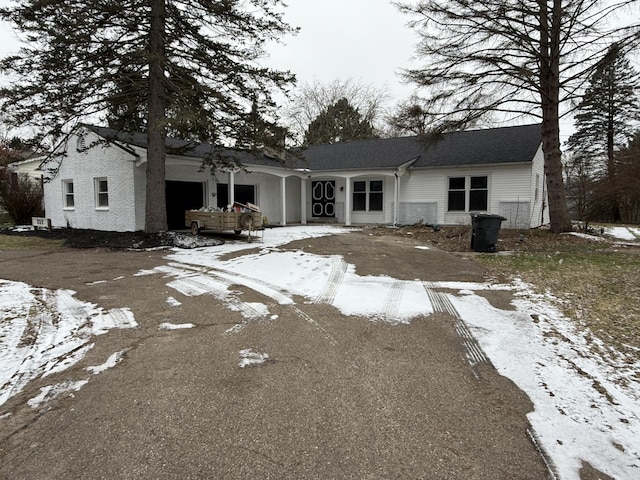 single story home with a garage