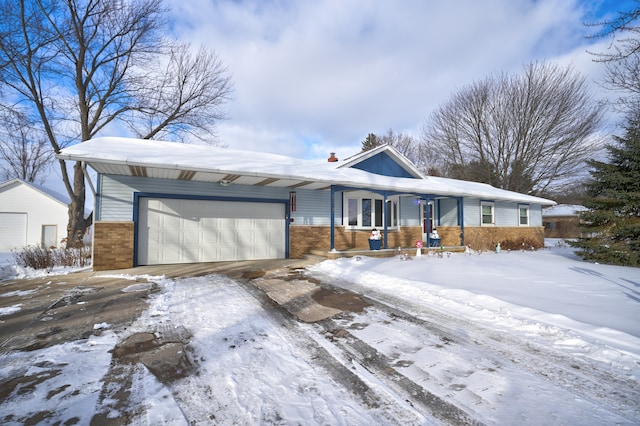 single story home featuring a garage and a porch