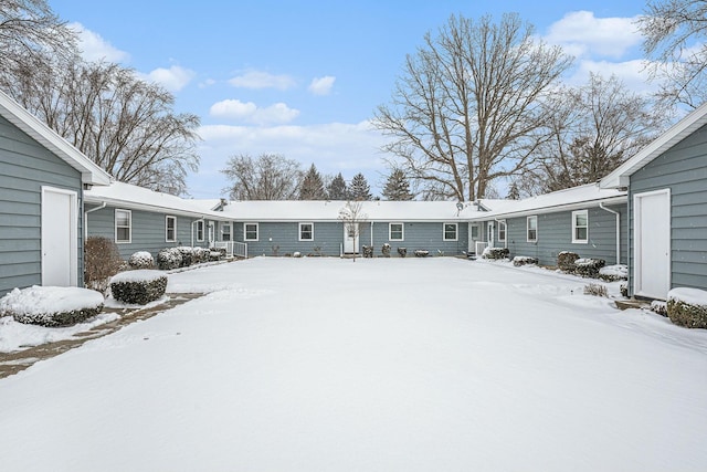 view of snow covered property