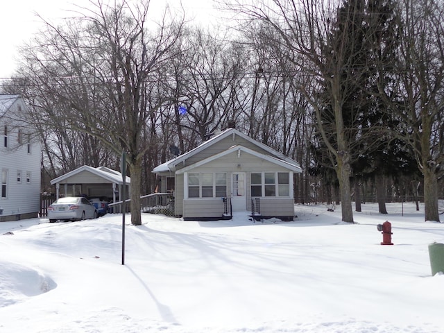 view of front of house featuring a carport