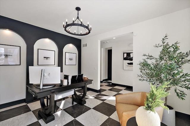 office space with visible vents, baseboards, and a chandelier