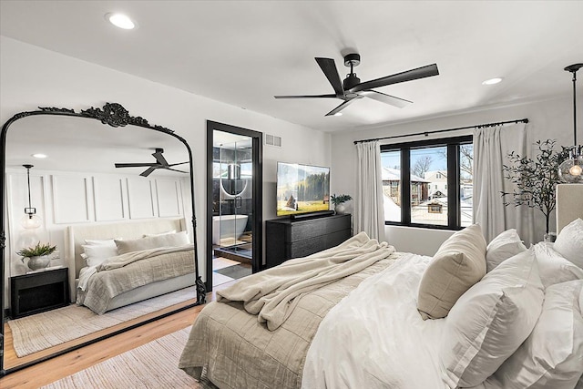 bedroom featuring light wood-style floors, recessed lighting, visible vents, and ceiling fan