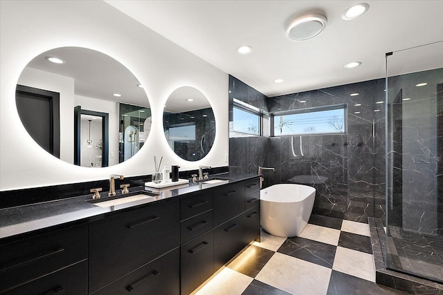 bathroom featuring recessed lighting, a sink, and walk in shower