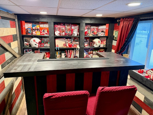 bar with a paneled ceiling