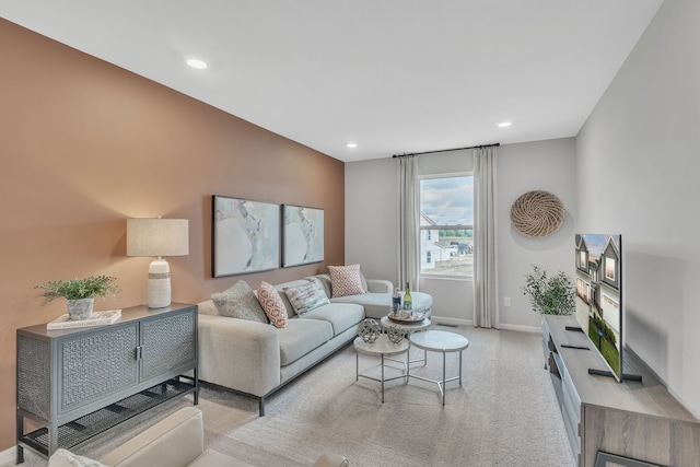 living room with light colored carpet