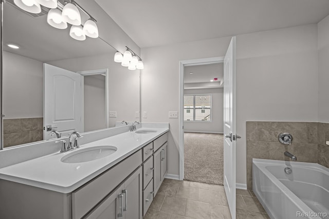 2302 Mill Ln, Saline, MI 48176 - full bath featuring double vanity, a bath, tile patterned floors, and baseboards